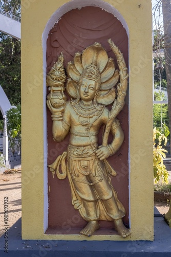 A figure of naga king (cobra king) in Sri Bodhirajaramaya Buddhist temple in Thelulla, Sri Lanka