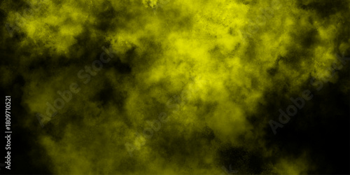 Yellow color powder explosion cloud isolated on black background.  dust smoke . Yellow dust particles explosion background .