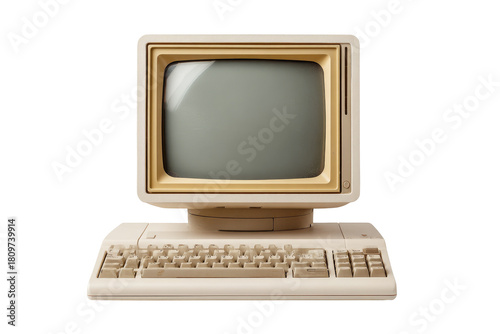 Vintage beige computer.  A cream-colored, retro-style computer monitor and keyboard.  The monitor displays a light gray screen.  The computer appears isolated on a dark background