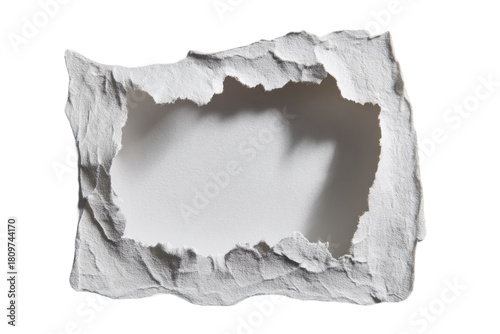 Ripped white paper with a central hole