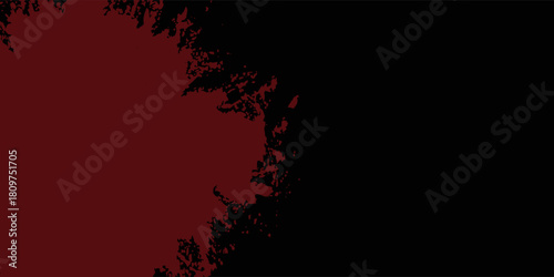Dark grunge background featuring a rough red splatter texture on a black backdrop, creating a dramatic and intense abstract design.