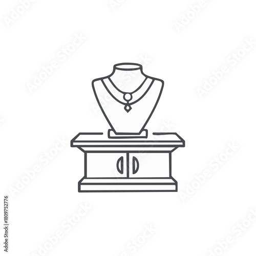 Elegant necklace displayed on a jewelry bust atop a cabinet line art illustration