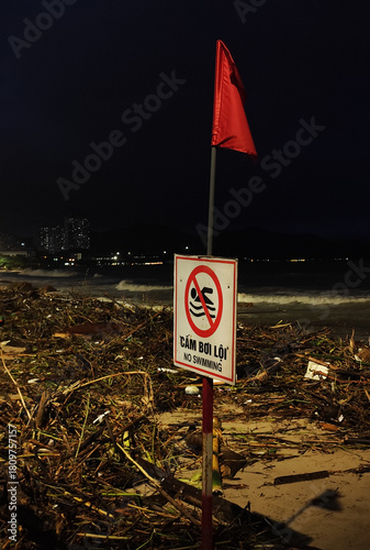 Rainy season storm damage on Nha Trang beach with 