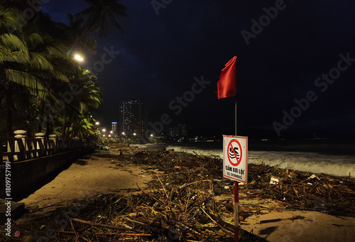 Rainy season storm damage on Nha Trang beach with 
