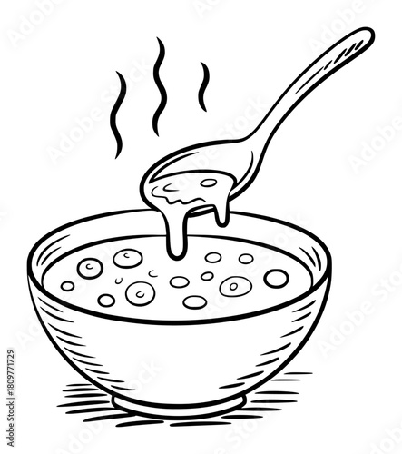 A Spoonful of Hot Soup Being Served From a Bowl