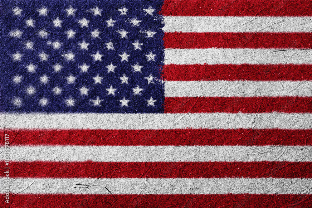 Fototapeta premium A textured image displays the flag of the United States of America, featuring its iconic stars and stripes with a unique grainy and slightly weathered visual effect that evokes
