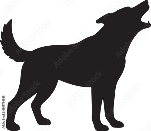 A striking silhouette of a howling wolf captured in a dramatic pose