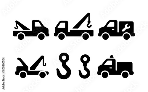 Silhouette tow trucks and hooks set for automotive service icons and design