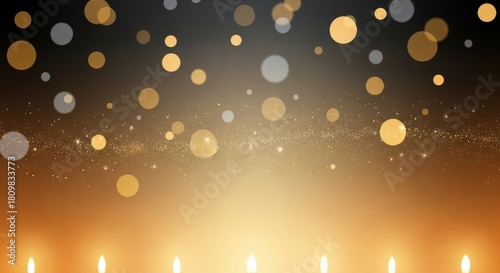 Warm glowing abstract background with sparkling bokeh lights and candle flames