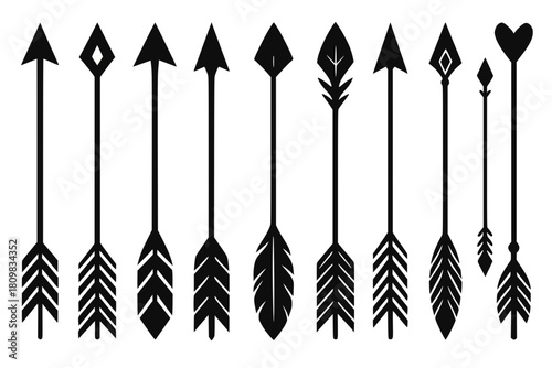 Silhouette set of decorative arrows, each featuring different geometric tips and feather patterns, white background