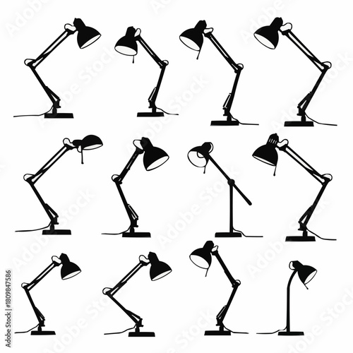 Collection of black desk lamps in various positions, isolated on white background.