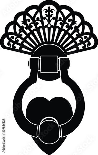 Ornate black silhouette of a heart shaped drawer pull with fan top