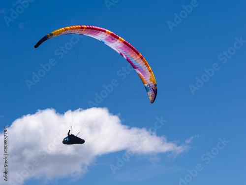 paragliding in the blue sky