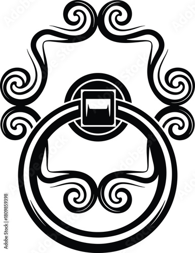 Ornate vintage door knocker with swirling decorative elements