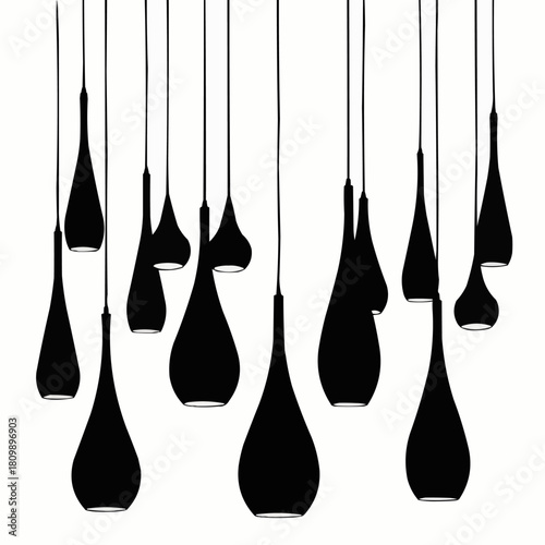 Modern teardrop pendant lights hanging in a cluster.