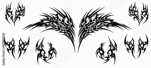 Tribal Tattoo Design Elements Featuring Abstract Wing Shapes and Stylized Fire Motifs