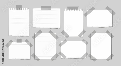 Collection of blank white paper notes with torn edges taped to a surface.