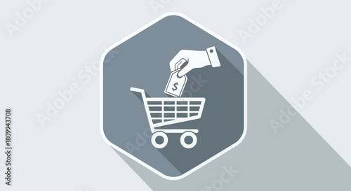 Hand placing dollar bill into shopping cart