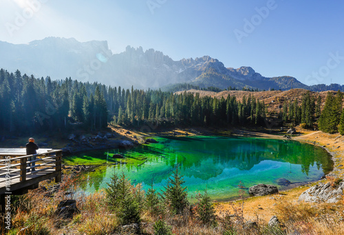 Scenic autumn landscape of Carezza lake or Lago di Carezza, Karersee in Dolomites Alps, South Tyrol, Italy, Europe	