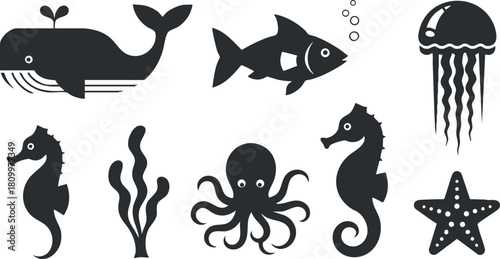 Stylish black silhouette vector illustration set featuring various marine animals like whales, fish, jellyfish, and seahorses for creative design projects.