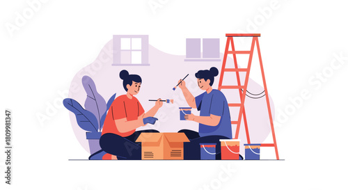 Happy young couple works together painting the walls of their new home during a renovation project with supplies nearby.