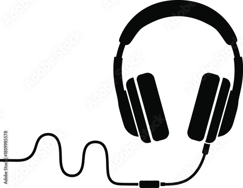 Simple black and white illustration of over ear headphones with a cable