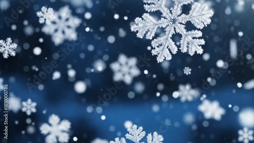 Macro. Drift of white snowflakes on a deep blue gradient, varied sizes, crystalline textures, soft lighting, shallow depth of field with the midground in focus and blurred foreground and background