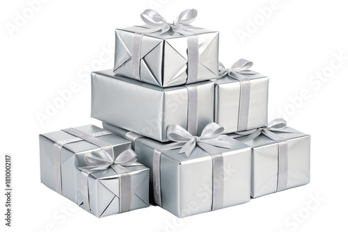 A shiny pyramid of silver Christmas gift boxes wrapped in metallic foil and decorated with elegant silver bows. The bright reflective surfaces create a clean, modern, festive look. Perfect for winter 