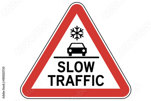 Warning sign for slow traffic due to snow and icy conditions on the road