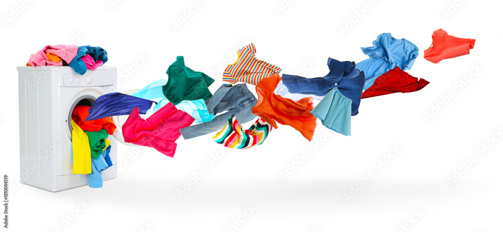 Obraz premium Washing machine and flying laundry on white background