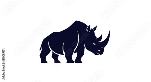 Dark blue silhouette of a rhinoceros on white background, facing left