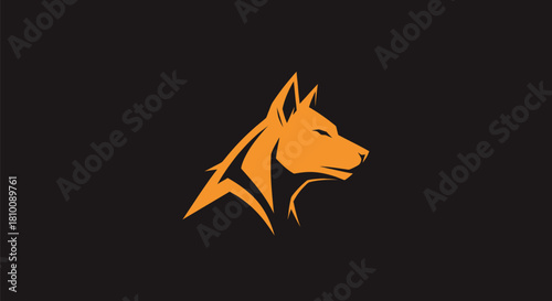 Geometric orange wolf head profile on black background. Minimalist and stylized