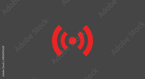 Red concentric arcs and circle over gray background