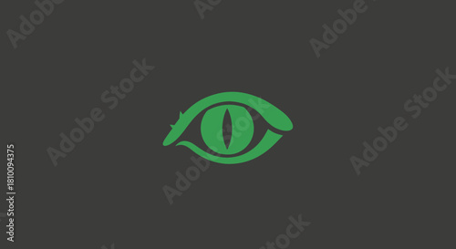 Green reptilian eye graphic on dark gray background