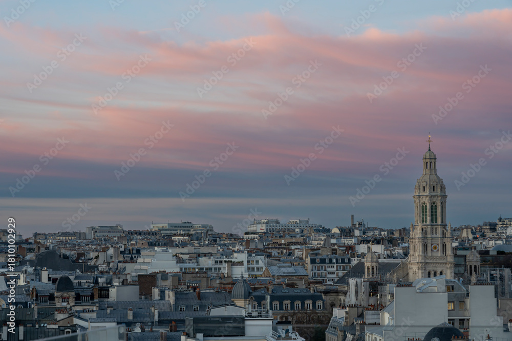 Obraz premium Paris, France - 11 20 2025: Boulevard Haussmann. Panoramic view of Paris and Church of the Holy Trinity from Galeries Lafayette Paris Haussmann roof terrace at christmas