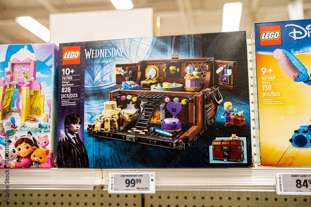 Naklejka premium Close up of Lego Wednesday Thing's Apartment building set on store shelf. Brampton, Canada - November 16, 2025.