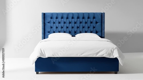 Elegant blue velvet bed with tufted headboard rotating in a bright studio environment for