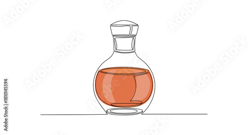 Clear glass decanter with amber liquid on neutral background  