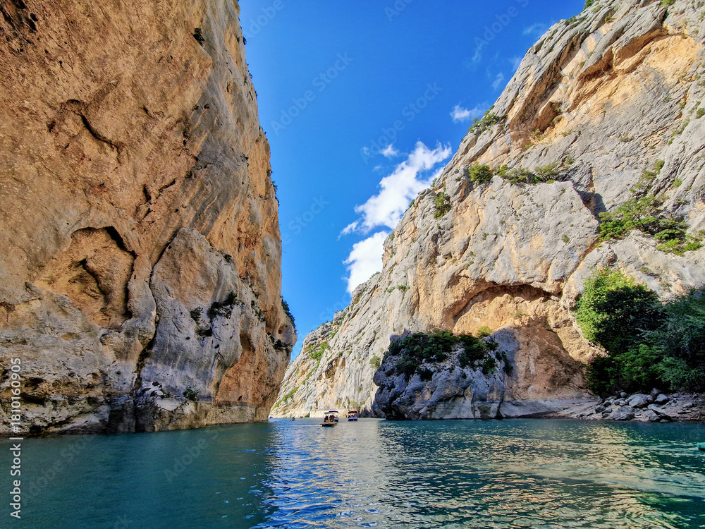 Fototapeta premium Boat trip on turquoise water of mountain canyon, Verdon Gorge in french Alps, Provence France.