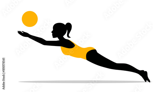 A volleyball player catches a ball in mid-jump. Beach sports.