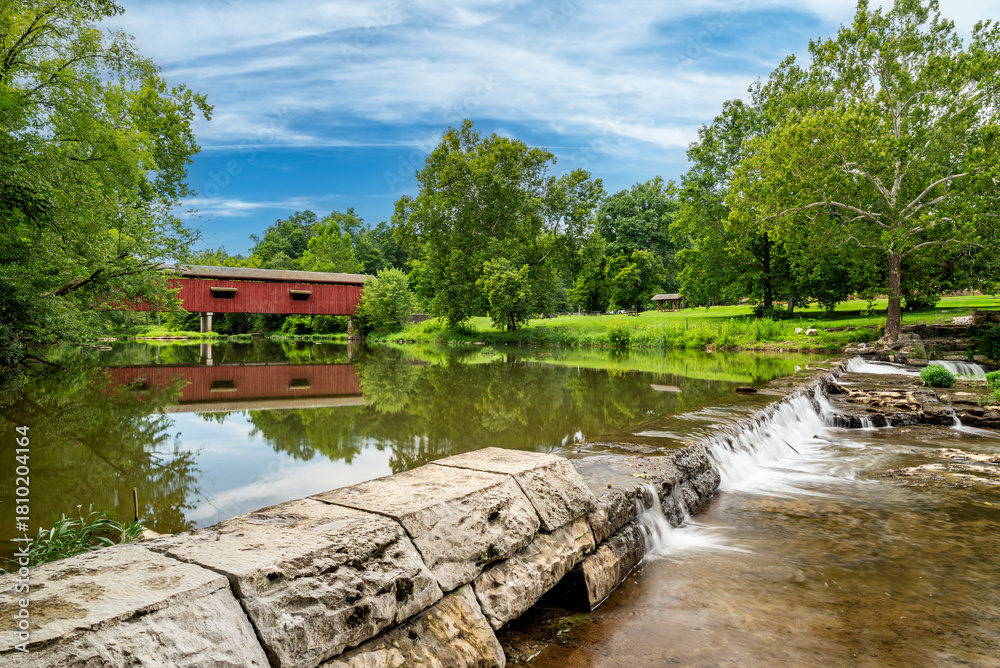 Fototapeta premium Historic Cataract Falls Covered Bridge and Mill Ruins - Cataract Falls State Recreation Area - Owen County, Indiana