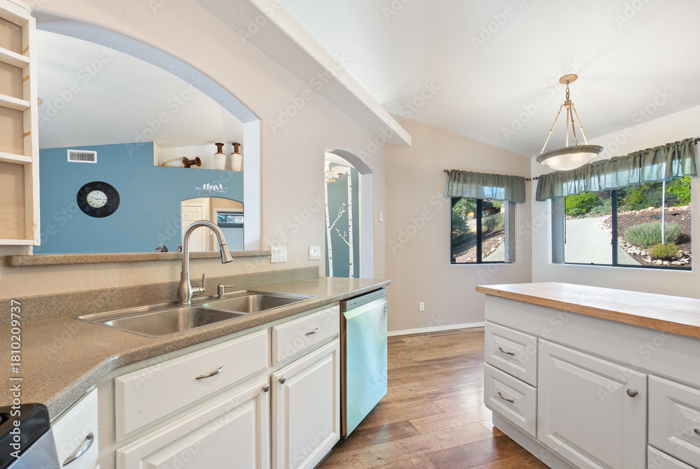 Fototapeta premium Contemporary Kitchen Design with Open Layout and Natural Light