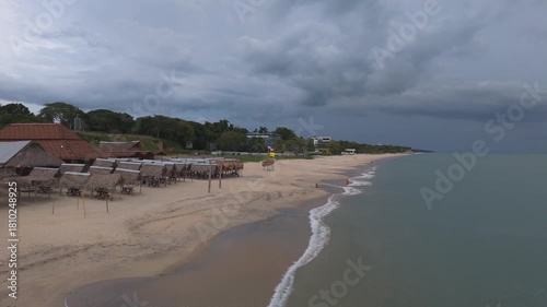 Aerial shot taken with a drone on Santa Clara beach on a cloudy day by the Pacific Ocean in the province of Coclé in Rio Hato, Panama.