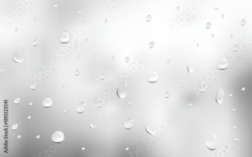 Realistic clear raindrops running down glass with natural liquid flow shapes.