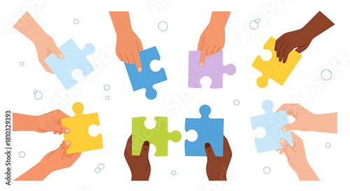 Hands connecting puzzle pieces - teamwork, collaboration, and unity concept