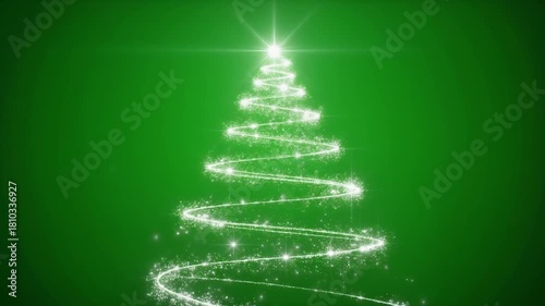 An enchanting, luminous Christmas tree, meticulously formed by a swirling trail of sparkling light particles, glows brightly against a festive green backdrop.