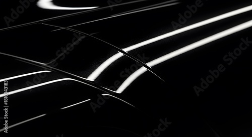 Abstract Black Surface with Reflective White Light Stripes perfect for website banner, presentation background, technology branding, luxury product