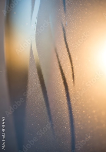 Subtle light diffracted through frosted glass, revealing blurred patterns