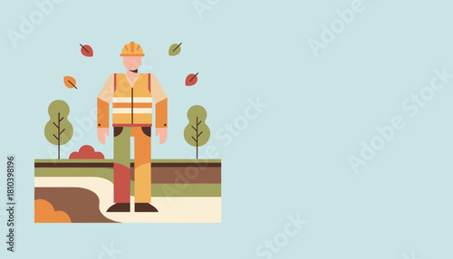 Worker in safety gear standing in an autumnal park setting