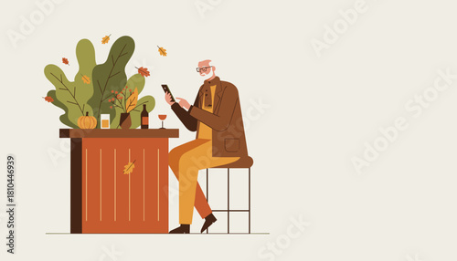 Elderly man relaxing and texting on phone at an autumn bar or cafe